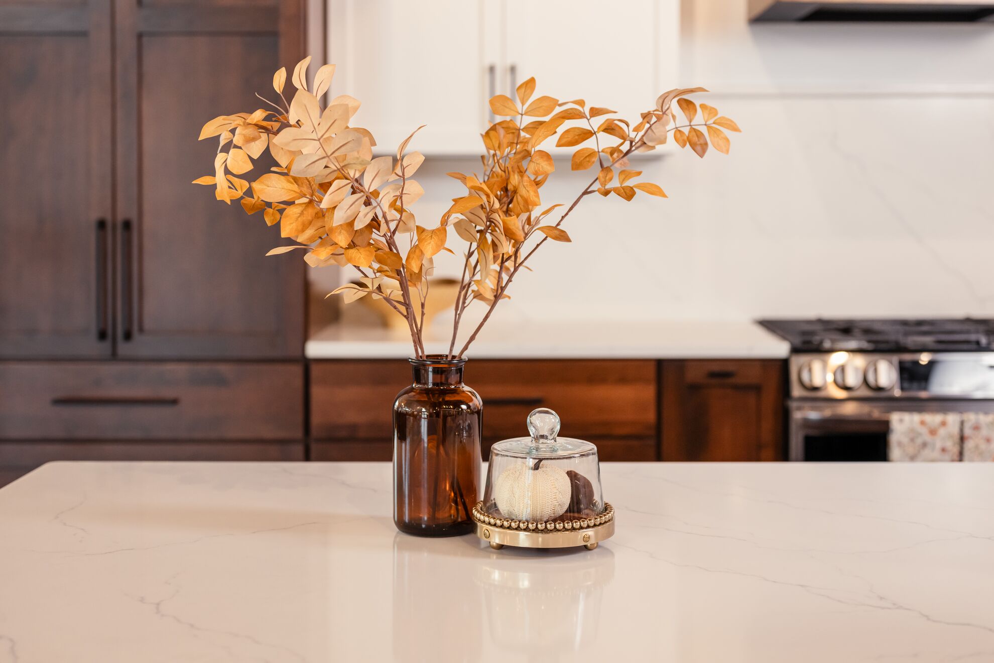 Cherry with French Roast & Snowflake cabinets with fall decor.