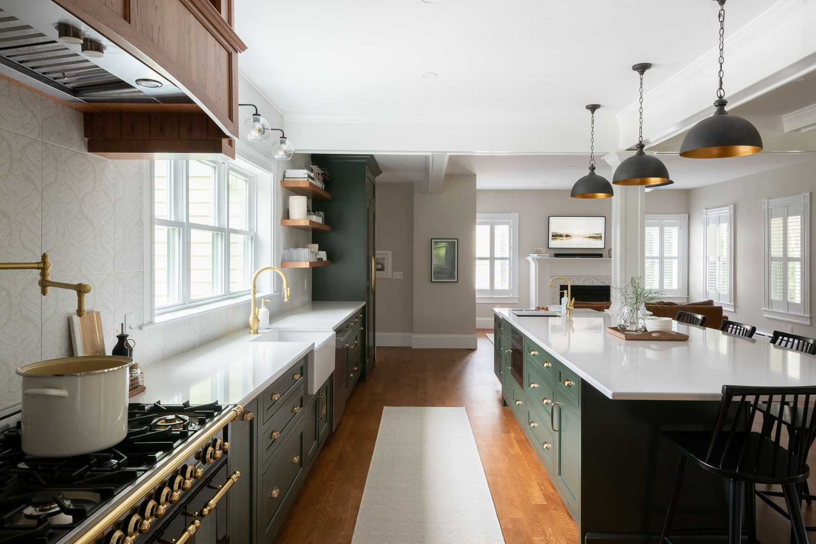 Custom green kitchen with gold hardware